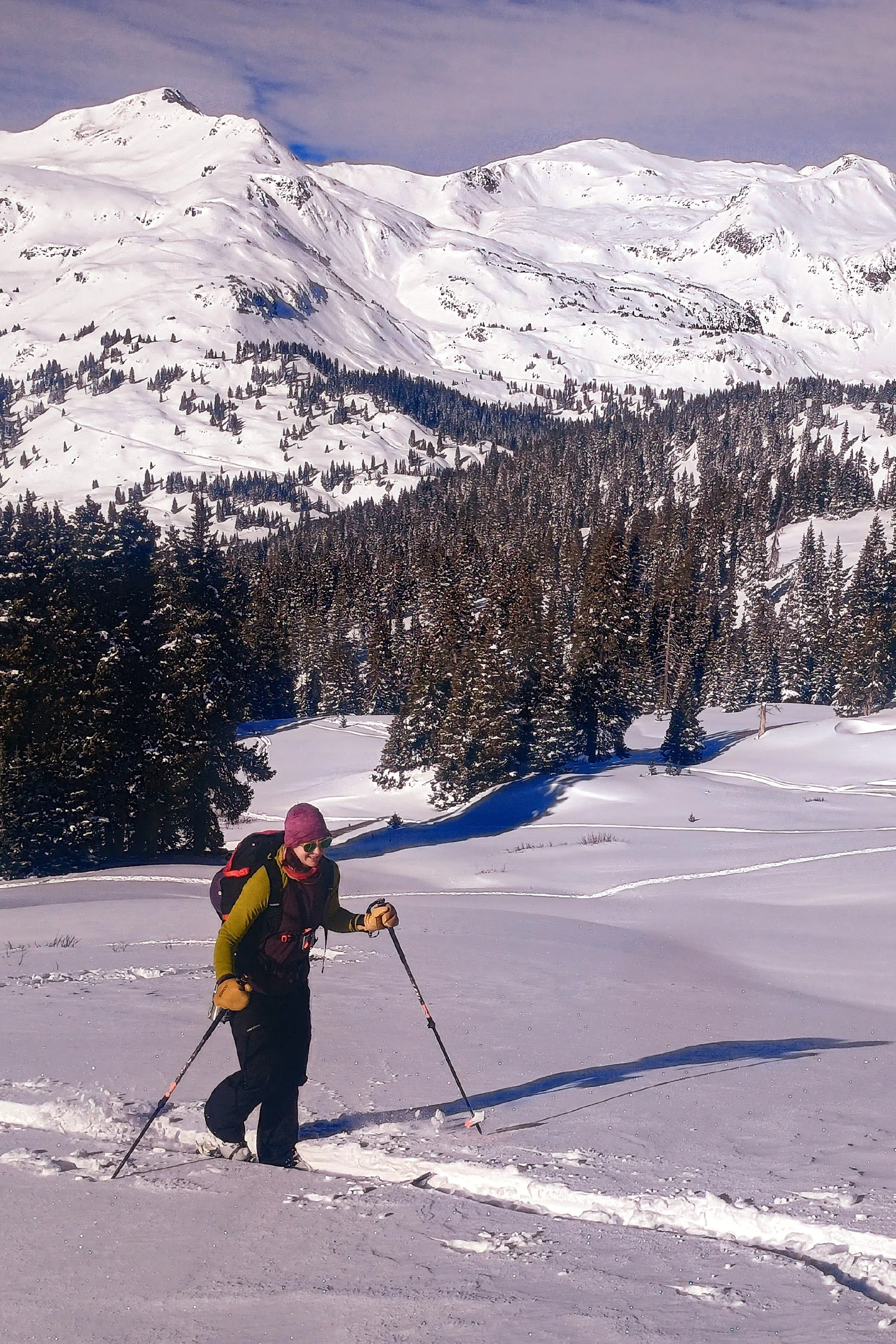 Woman skiing in Colorado mountains demonstrating athletic training and outdoor fitness